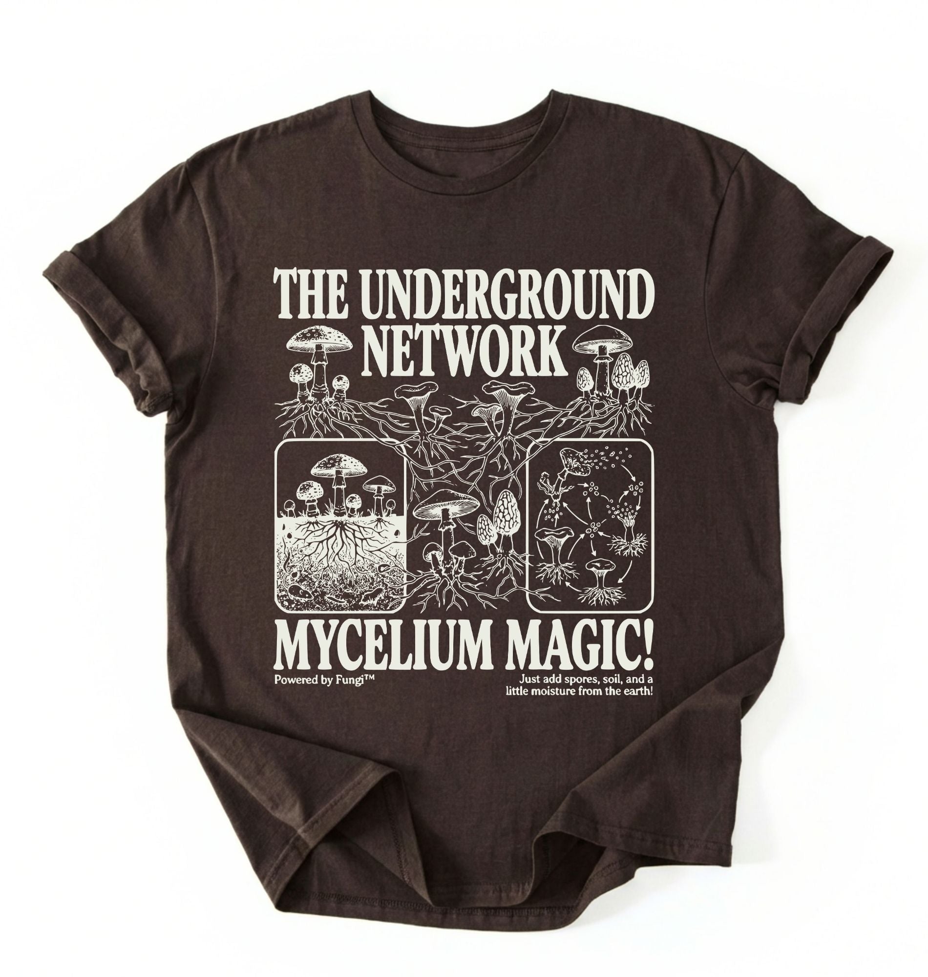 Flat lay of a brown chocolate t-shirt featuring Mycelium network mushroom and root network illustrations with text reading “The Underground Network Mycelium Magic” with forest fungi design perfect gift for mushroom lovers nature fans and cottagecore style on a white background 