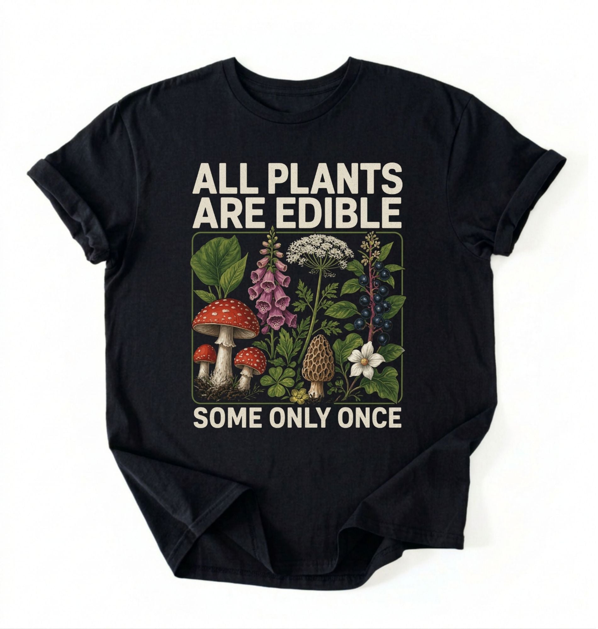 Flat lay of a black all plants are edible shirt black funny gardening t shirt plant lover gift botanical humor design on a white background 