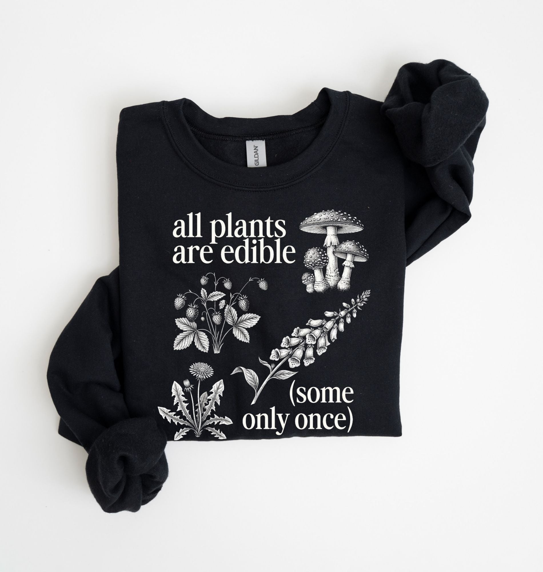 Flat lay of a black Funny plant lover sweatshirt some only once quote botanical illustration on a white background 