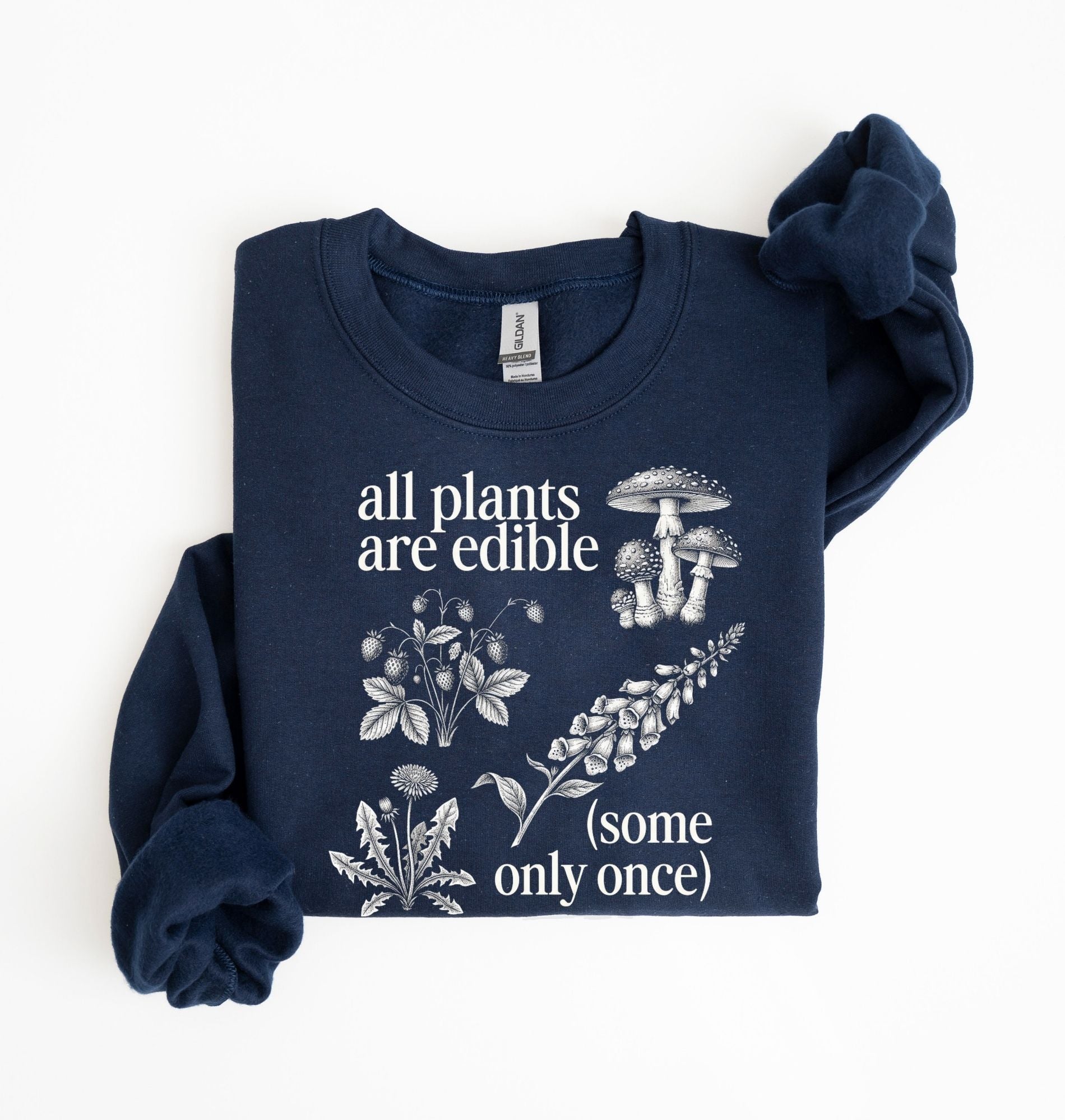 Flat lay of a navy blue Funny plant lover sweatshirt some only once quote botanical illustration on a white background 