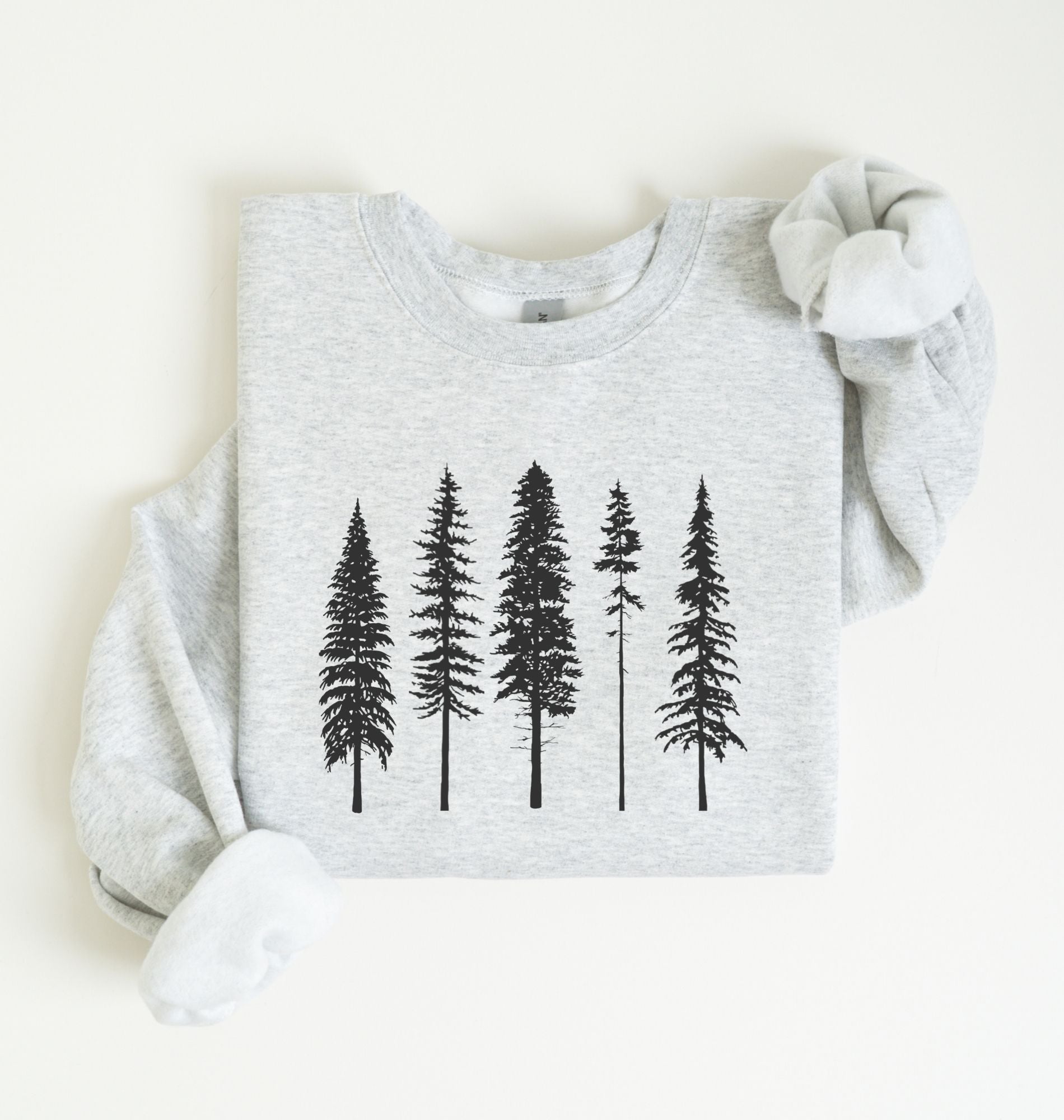 Minimalist pine trees sweatshirt with black forest tree design on ash cozy crewneck