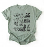 Flat lay of a bay Baby farm animals t-shirt with illustrated lamb, calf, piglet, duckling, chick, donkey, goat, and bunny on a white background