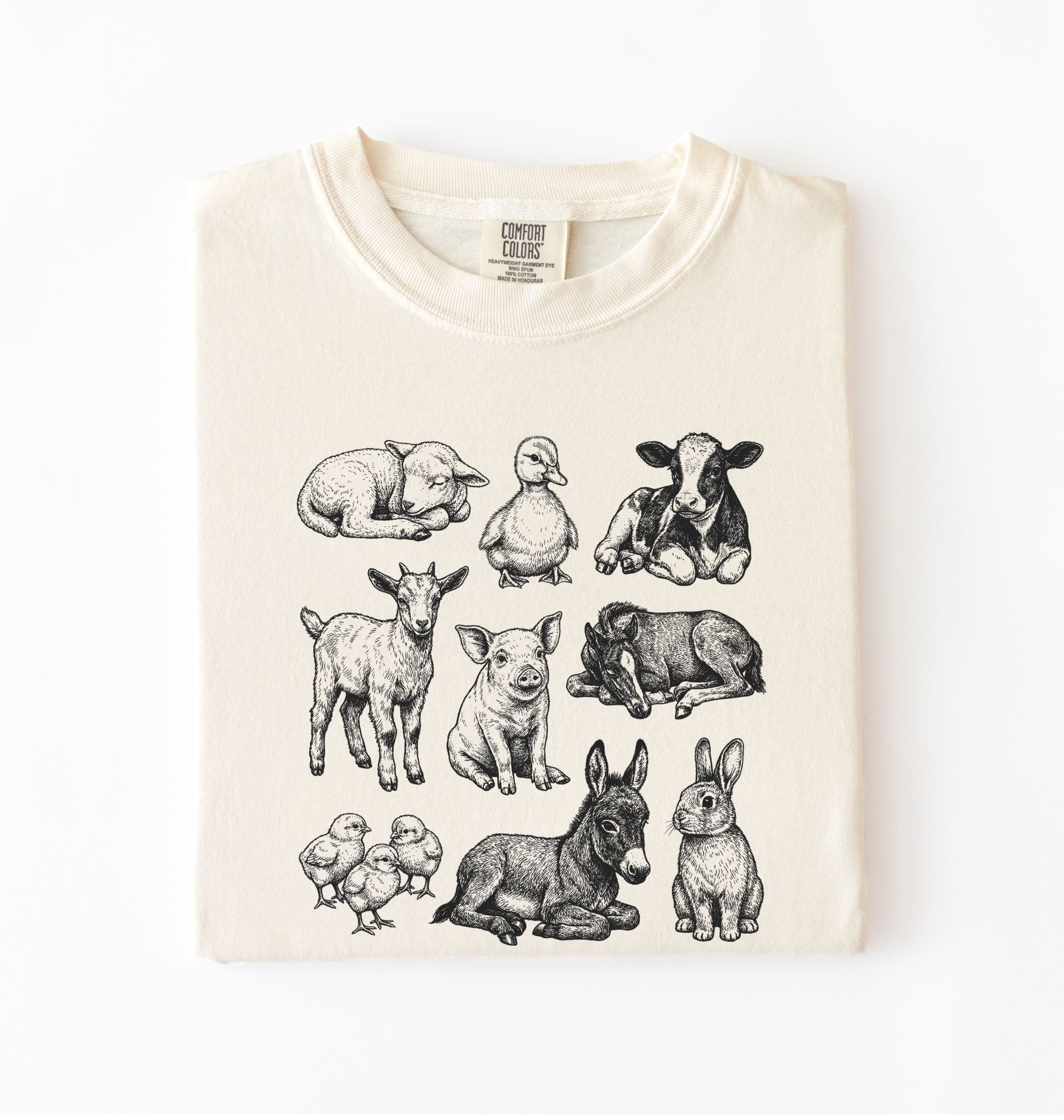 Baby farm animals t-shirt with illustrated lamb, calf, piglet, duckling, chick, donkey, goat, and bunny