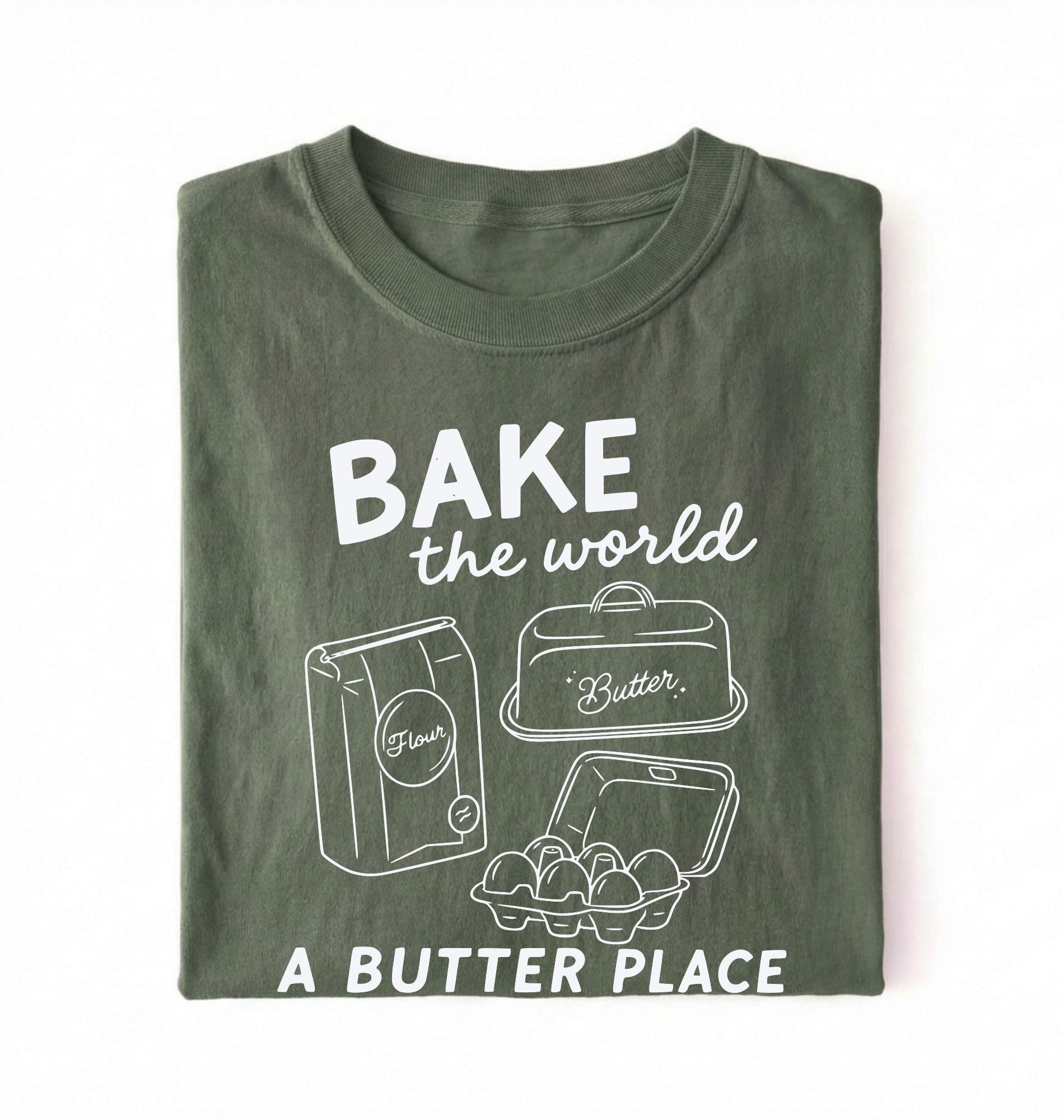 Flat lay of a Funny baking pun shirt with flour butter and eggs illustration on green tee on a white background 
