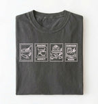 Flat lay of a gray Baking Addict Sourdough Mama graphic shirt with vintage baking stamp design for bread bakers on a white background 