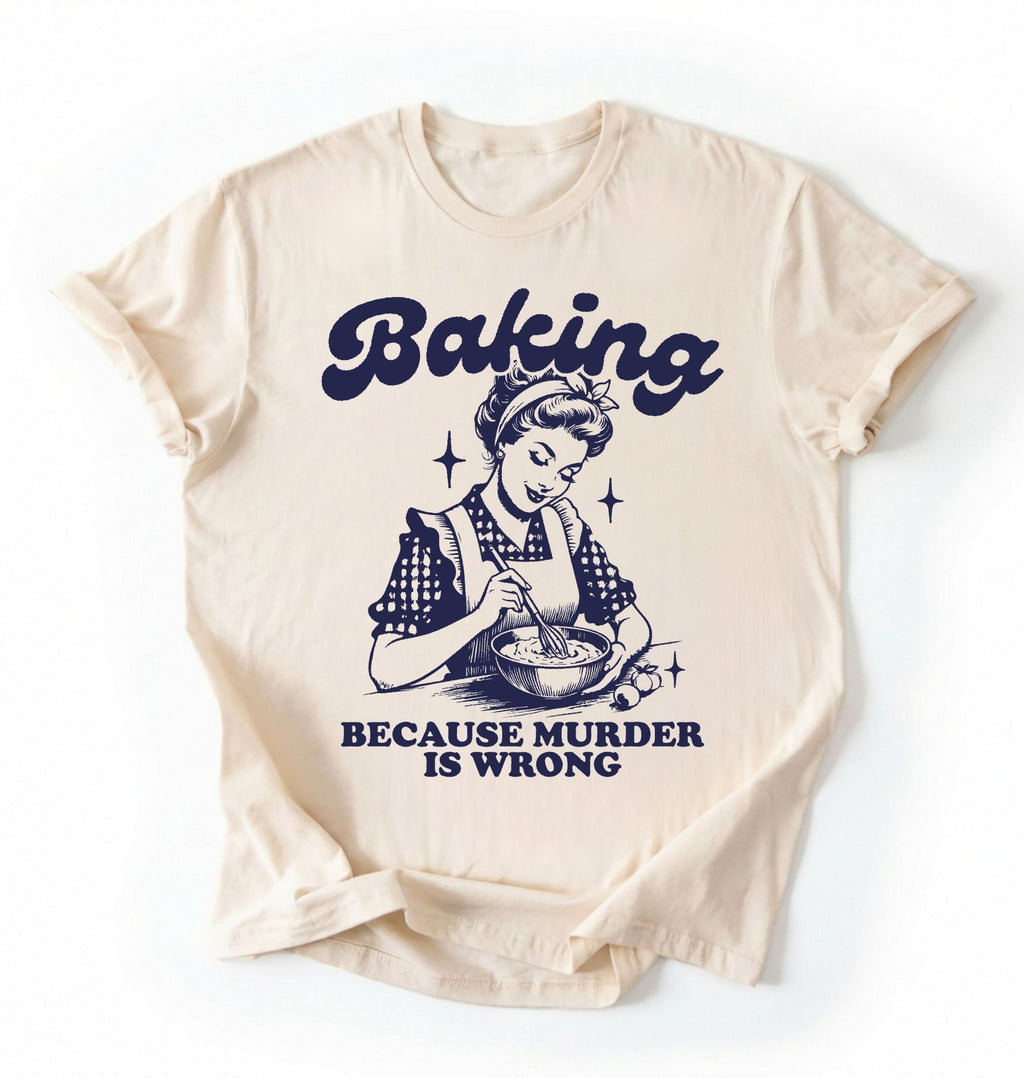Flat lay of an ivory baking because murder is wrong shirt cream funny baking t shirt baker humor vintage style gift on a white background 
