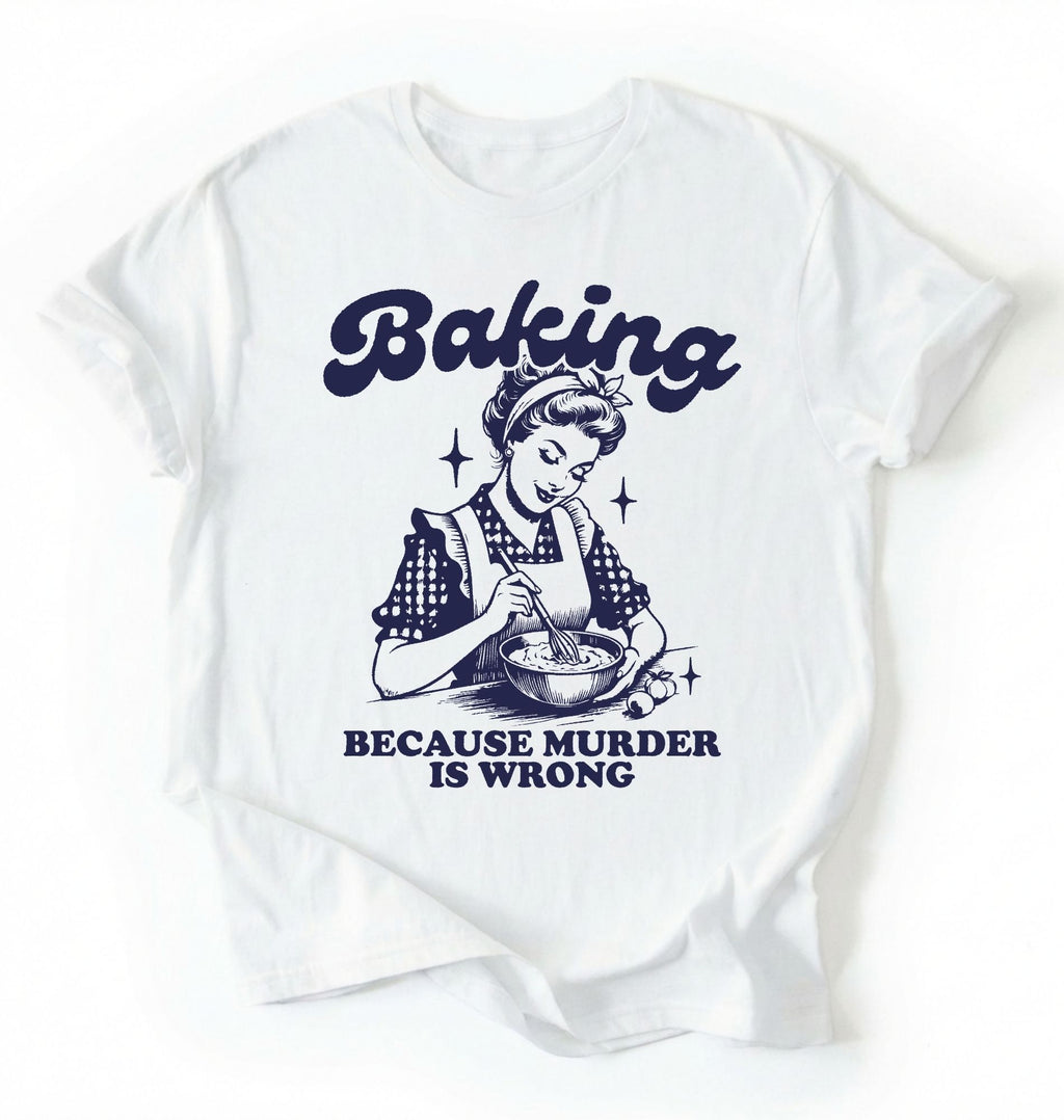 Flat lay of a white baking because murder is wrong shirt cream funny baking t shirt baker humor vintage style gift on a white background 