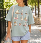 woman outdoors wearing a shirt that has 9 geese baking