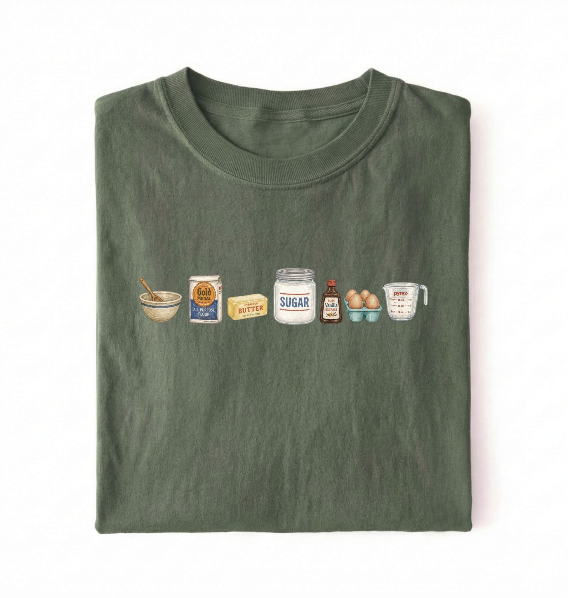 Flat lay of a green baking ingredients shirt with flour butter sugar eggs vanilla and measuring cup baker gift on a white background 