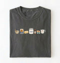 Flat lay of a charcoal baking ingredients shirt with flour butter sugar eggs vanilla and measuring cup baker gift on a white background 