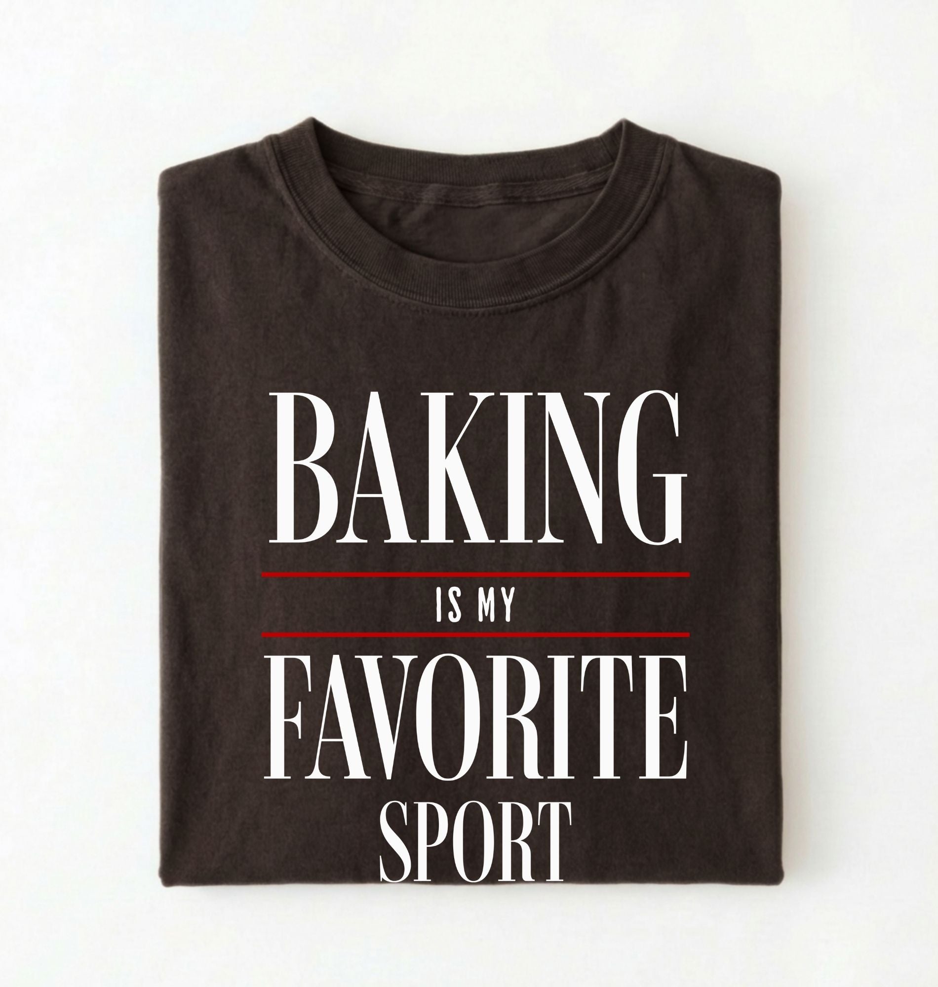 Flat lay of a brown Baking Is My Favorite Sport graphic shirt for home bakers and baking enthusiasts on a white background 