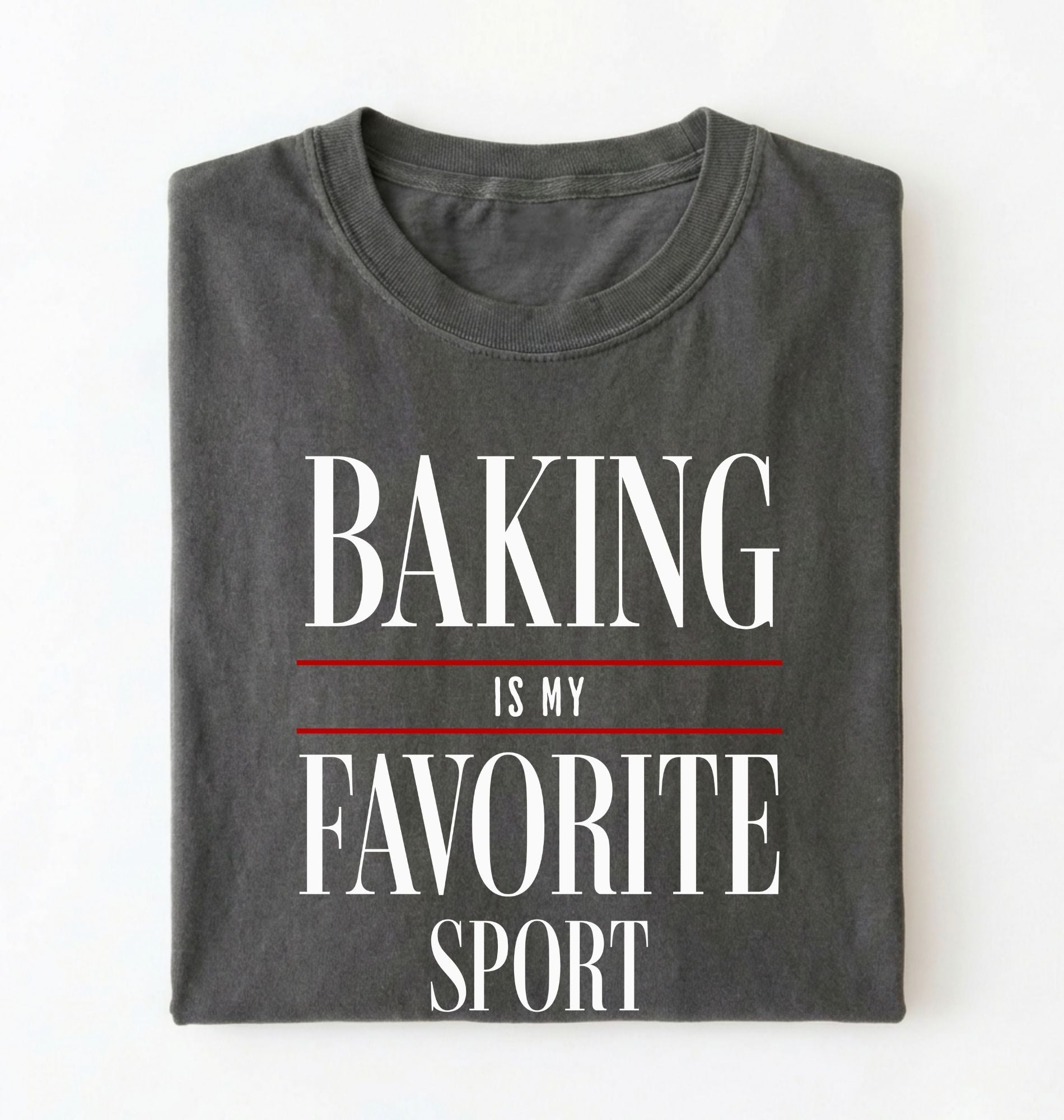 Flat lay of a gray Baking Is My Favorite Sport graphic shirt for home bakers and baking enthusiasts on a white background 