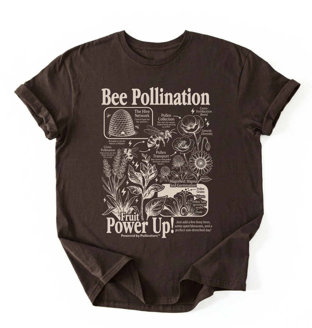 A dark brown short-sleeve t-shirt with a detailed white graphic print about bee pollination and its connection to fruit, laid flat against a white background.