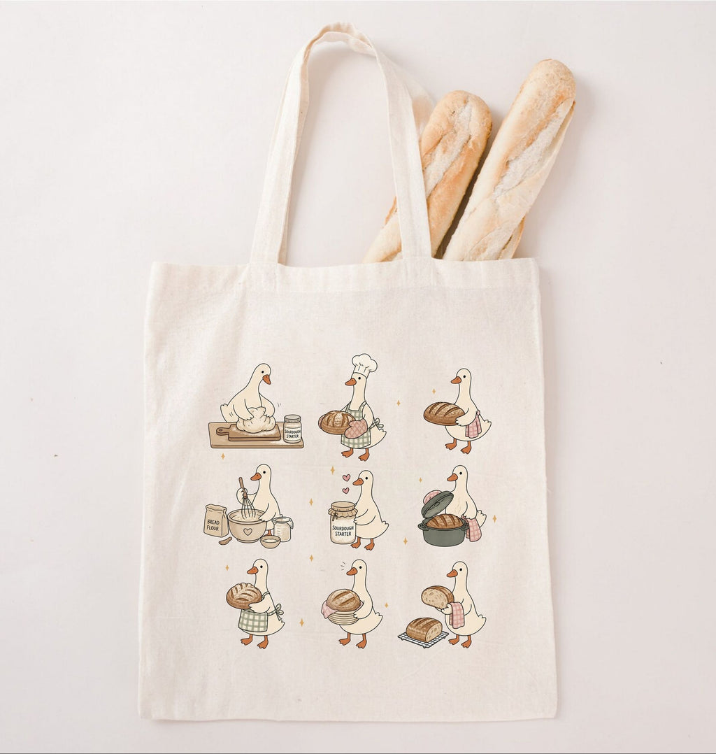 Cute goose tote bag featuring geese baking bread and carrying bakery ingredients