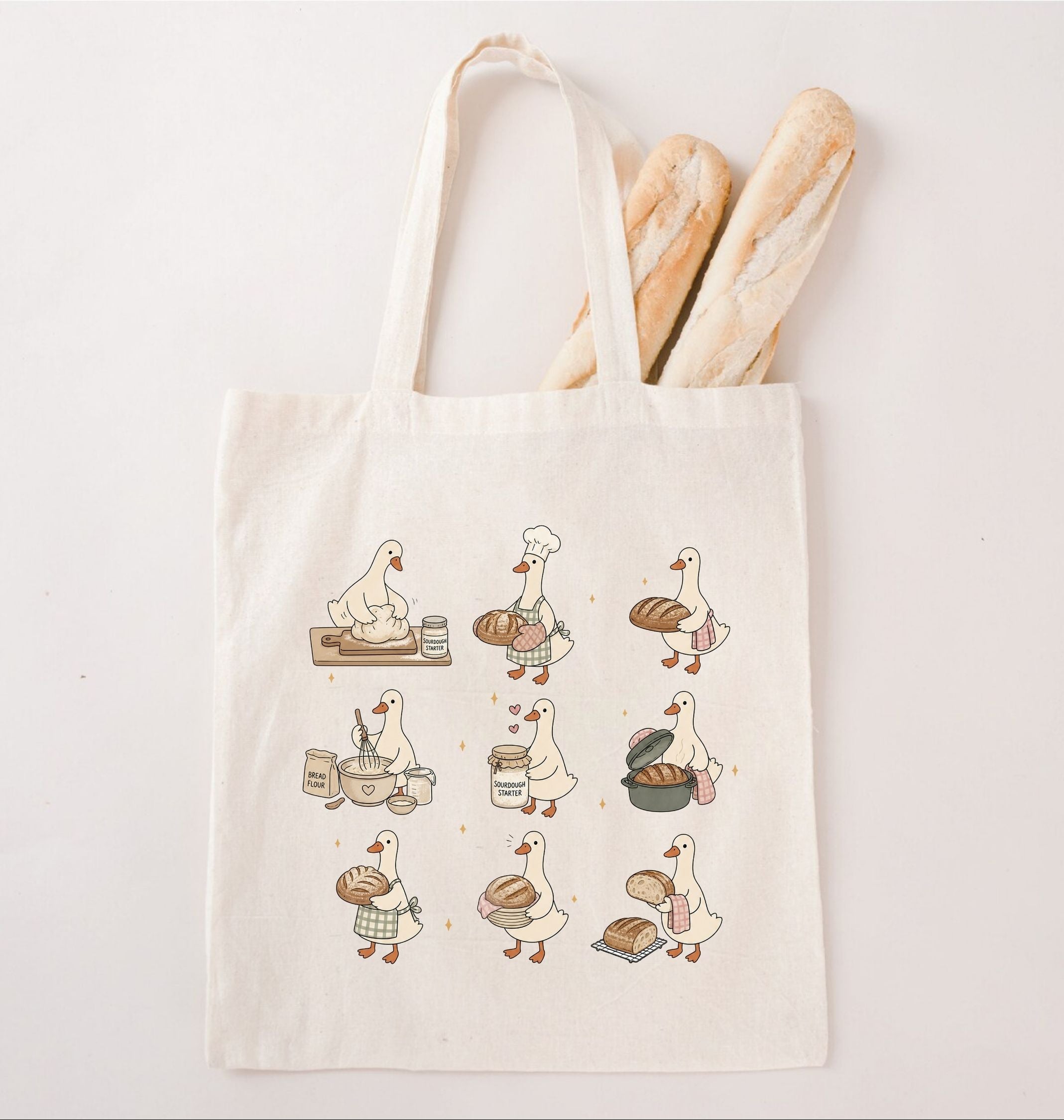 Cute goose tote bag featuring geese baking bread and carrying bakery ingredients