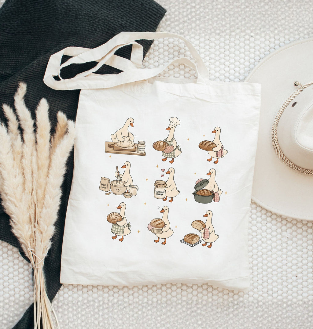 Cute goose tote bag featuring geese baking bread and carrying bakery ingredients