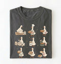 Flat lay of a Cute goose baker shirt with sourdough bread and cottagecore baking artwork on pepper tee on a white background 