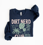 Flat lay of a navy blue Dirt nerd club sweatshirt with plant illustrations perfect gift for gardeners plant lovers and nature enthusiasts on a white background