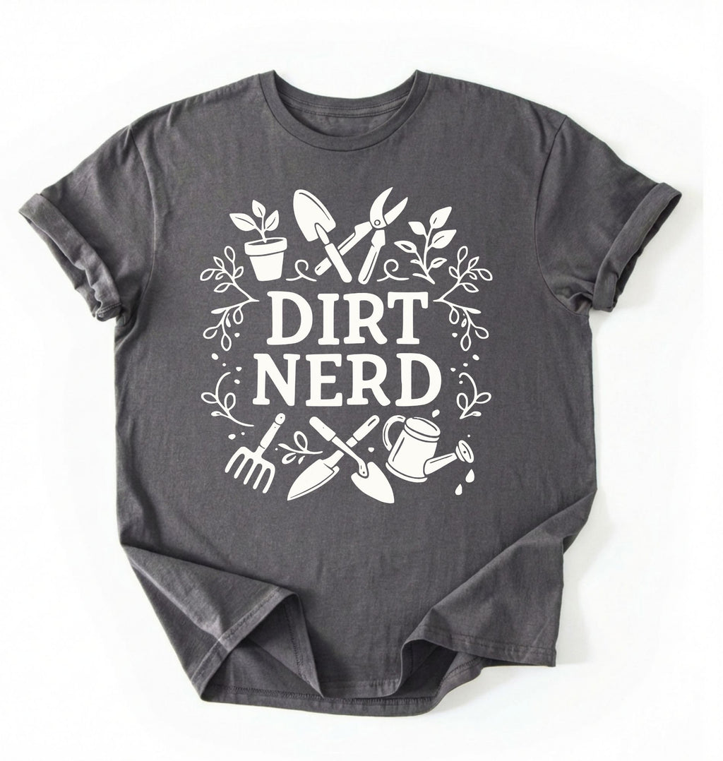 Flat lay of a charcoal Dirt nerd gardening shirt with tools and plant illustrations perfect gift for gardeners and plant lovers on a white background