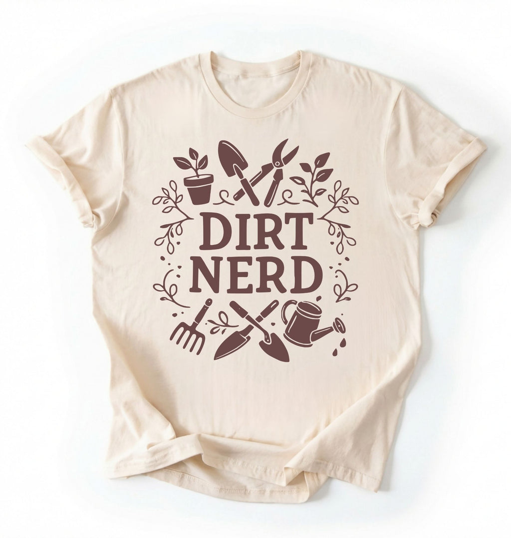 Flat lay of a natural Dirt nerd gardening shirt with tools and plant illustrations perfect gift for gardeners and plant lovers on a white background
