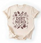 Flat lay of a natural Dirt nerd gardening shirt with tools and plant illustrations perfect gift for gardeners and plant lovers on a white background