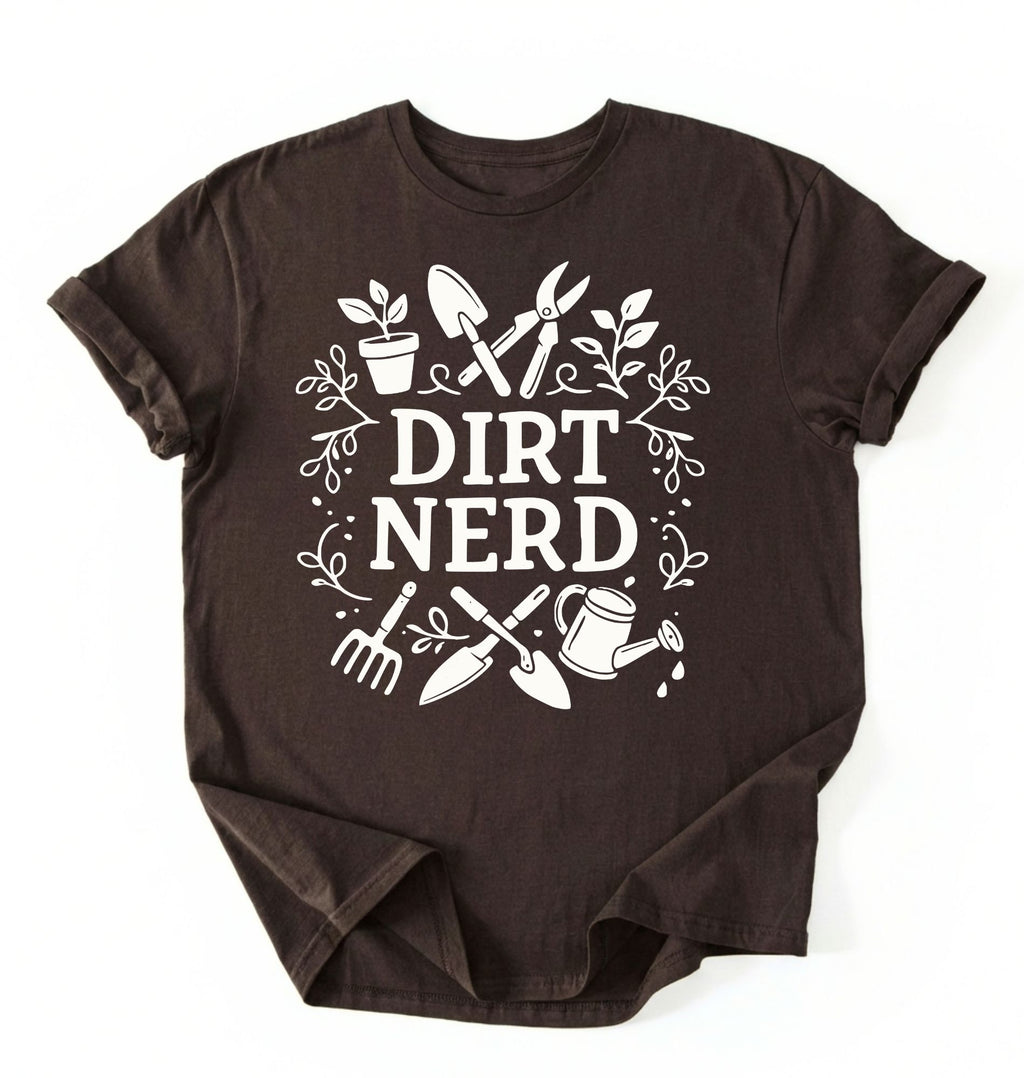 Flat lay of a dark chocolate Dirt nerd gardening shirt with tools and plant illustrations perfect gift for gardeners and plant lovers on a white background 