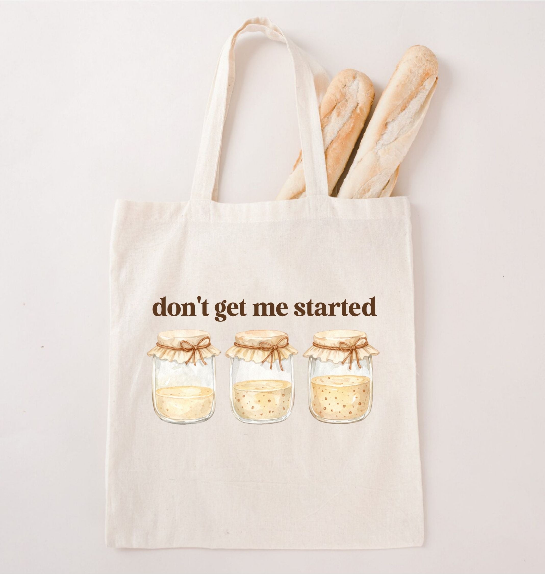 Reusable canvas tote bag with sourdough starter illustration and baking theme