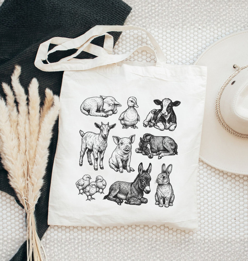 Farm animal canvas tote bag with vintage cow, pig, sheep, chicken, and duck illustrations