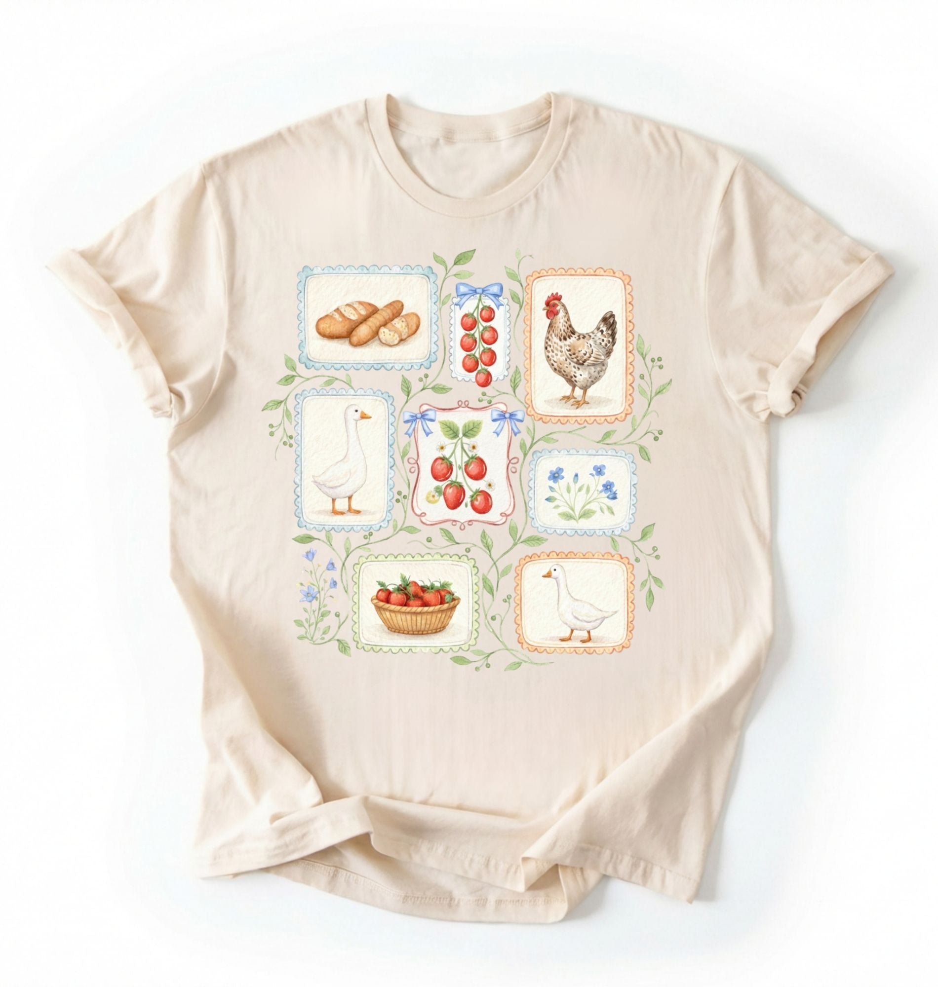 Flat lay of a natural t-shirt featuring vintage-style illustrations of bread, eggs, fruit, and chickens arranged in a grid pattern perfect homestead gardener gift for farm life lovers on a white background 