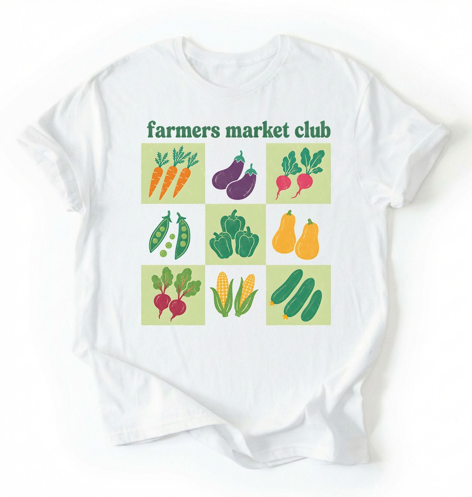 Flat lay of a white farmers market club shirt white vegetable gardening t shirt cottagecore farmer market gift on a white background 