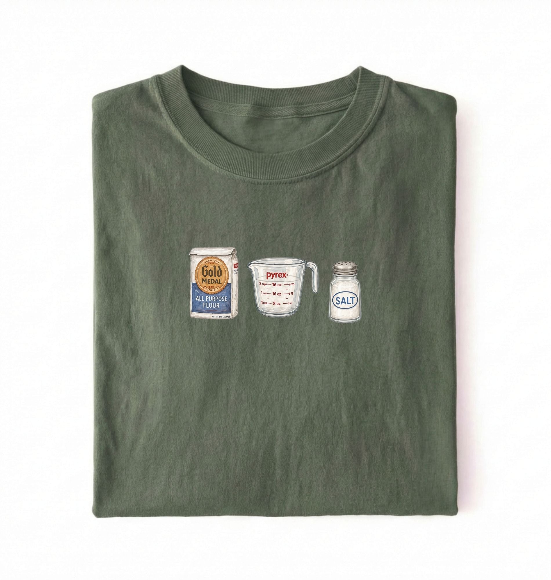 Flat lay of a green flour water salt shirt with flour bag measuring cup and salt shaker minimalist bread baker gift on a white background 
