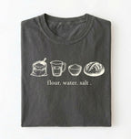 Flat lay of a pepper flour water salt shirt cream minimalist baking t shirt bread lover gift sourdough aesthetic design on a white background 