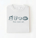 Flat lay of a white flour water salt shirt cream minimalist baking t shirt bread lover gift sourdough aesthetic design on a white background 
