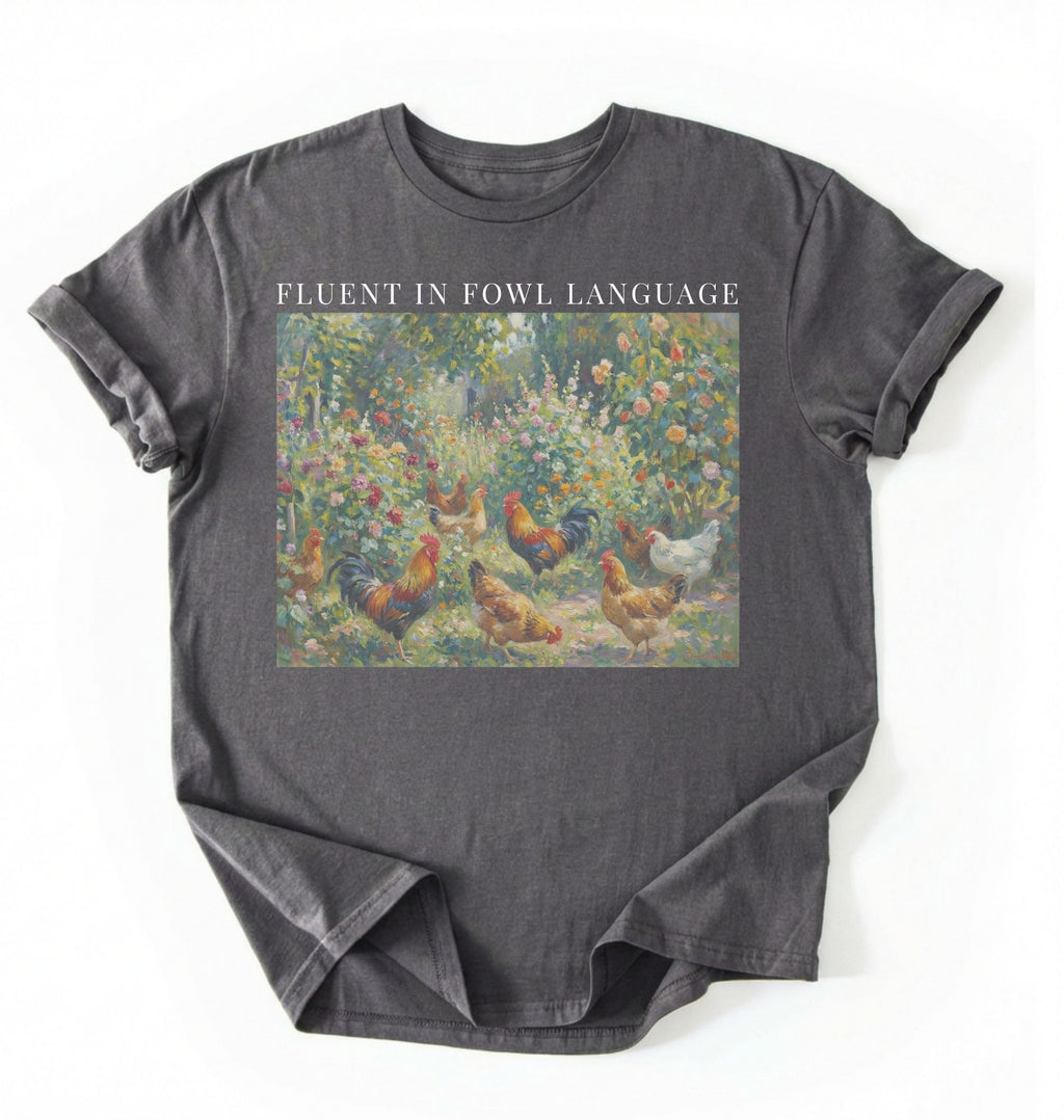 Flat lay of a Charcoal Funny Fluent in Fowl Language shirt for chicken lovers and farm animal fans on a white background