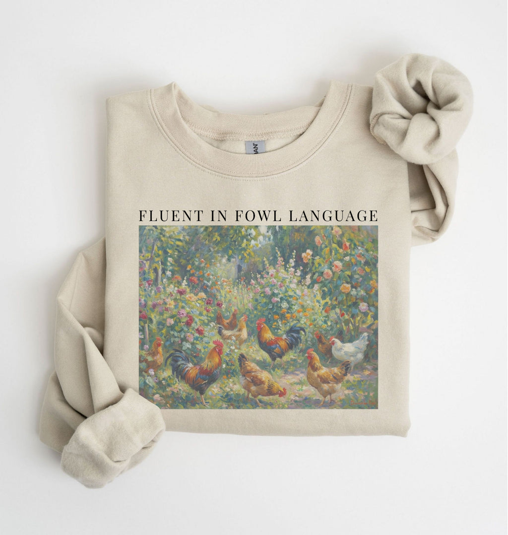 Fluent in fowl language sweatshirt with chickens in a garden illustration, perfect chicken lover farm gift