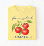 Yellow t-shirt with tomato graphic and text on a white background