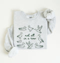 funny duck pun sweatshirt with hand drawn ducks and not all in a row phrase, cozy unisex nature gift