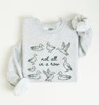 funny duck pun sweatshirt with hand drawn ducks and not all in a row phrase, cozy unisex nature gift