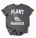 Flat lay of a pepper Gardening dad shirt featuring bold varsity style Plant Manager text on a white background 
