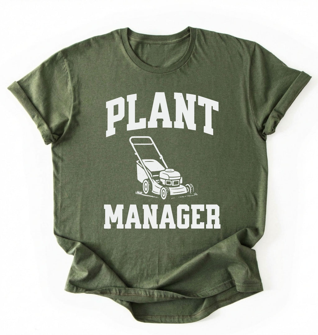 Flat lay of a Moss_Military_Green Gardening dad shirt featuring bold varsity style Plant Manager text on a white background 