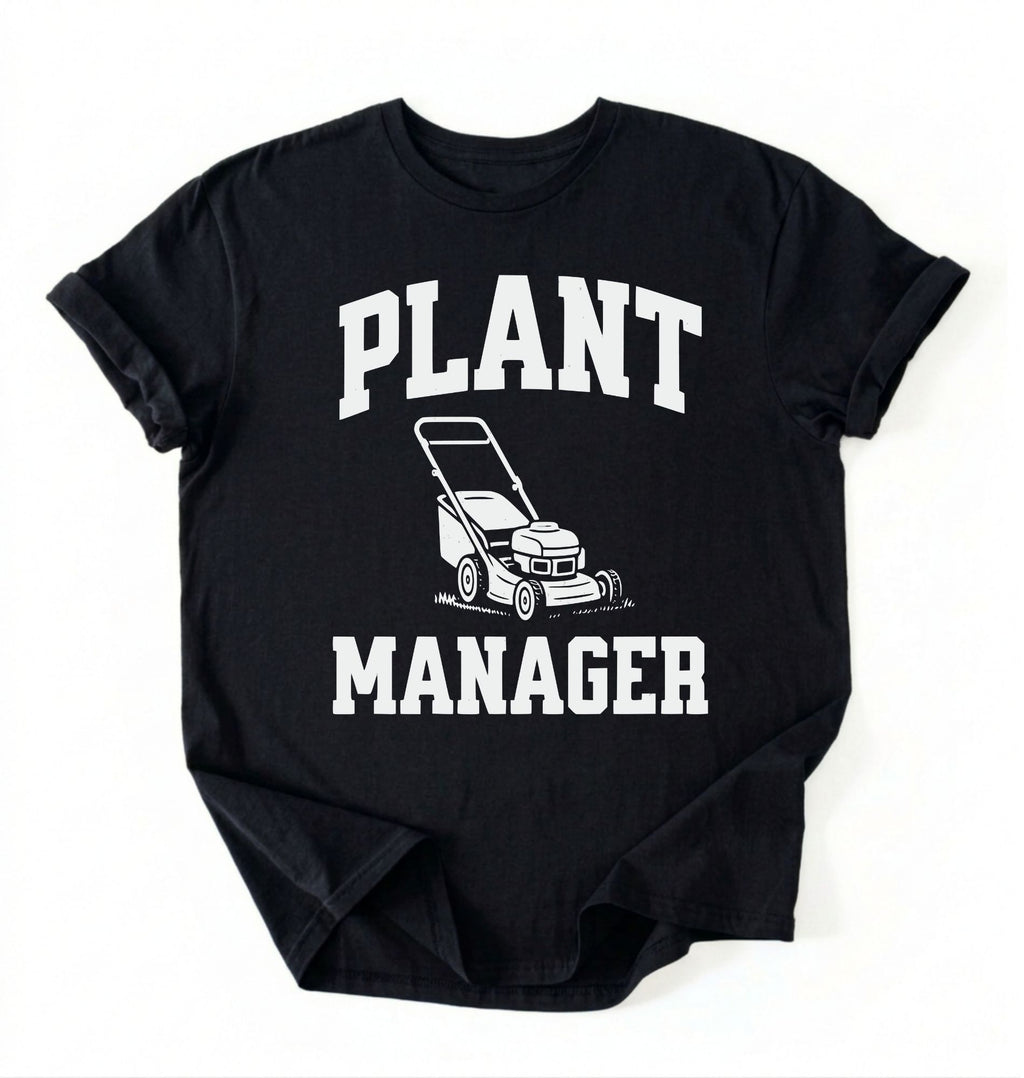 Flat lay of a black Gardening dad shirt featuring bold varsity style Plant Manager text on a white background 