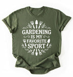 Flat lay of a moss military green Gardening is my favorite sport shirt with garden tools design perfect gift for gardeners and plant lovers on a white background