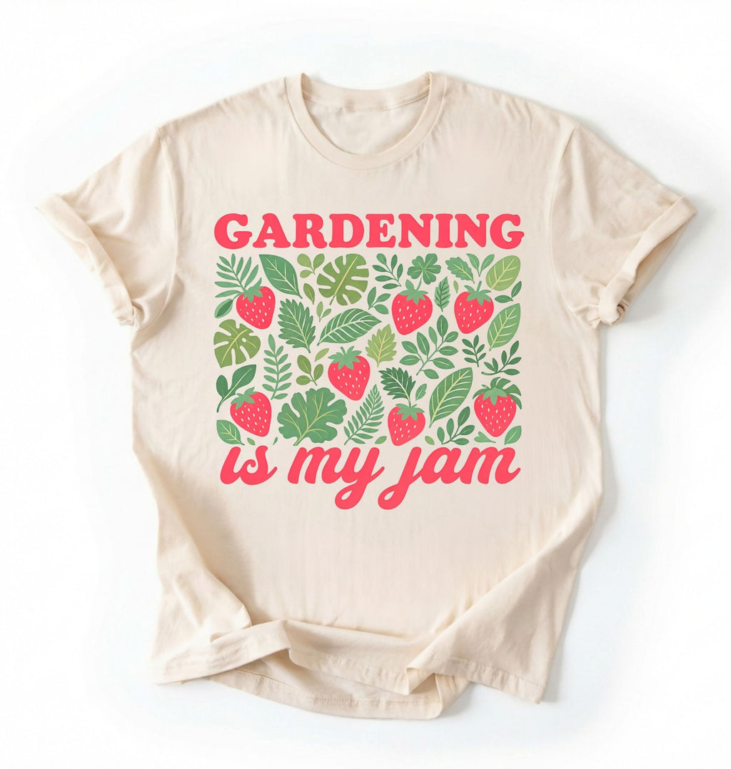 Flat lay of an ivory gardening is my jam shirt white funny plant lover t shirt cute strawberry garden gift on a white background 