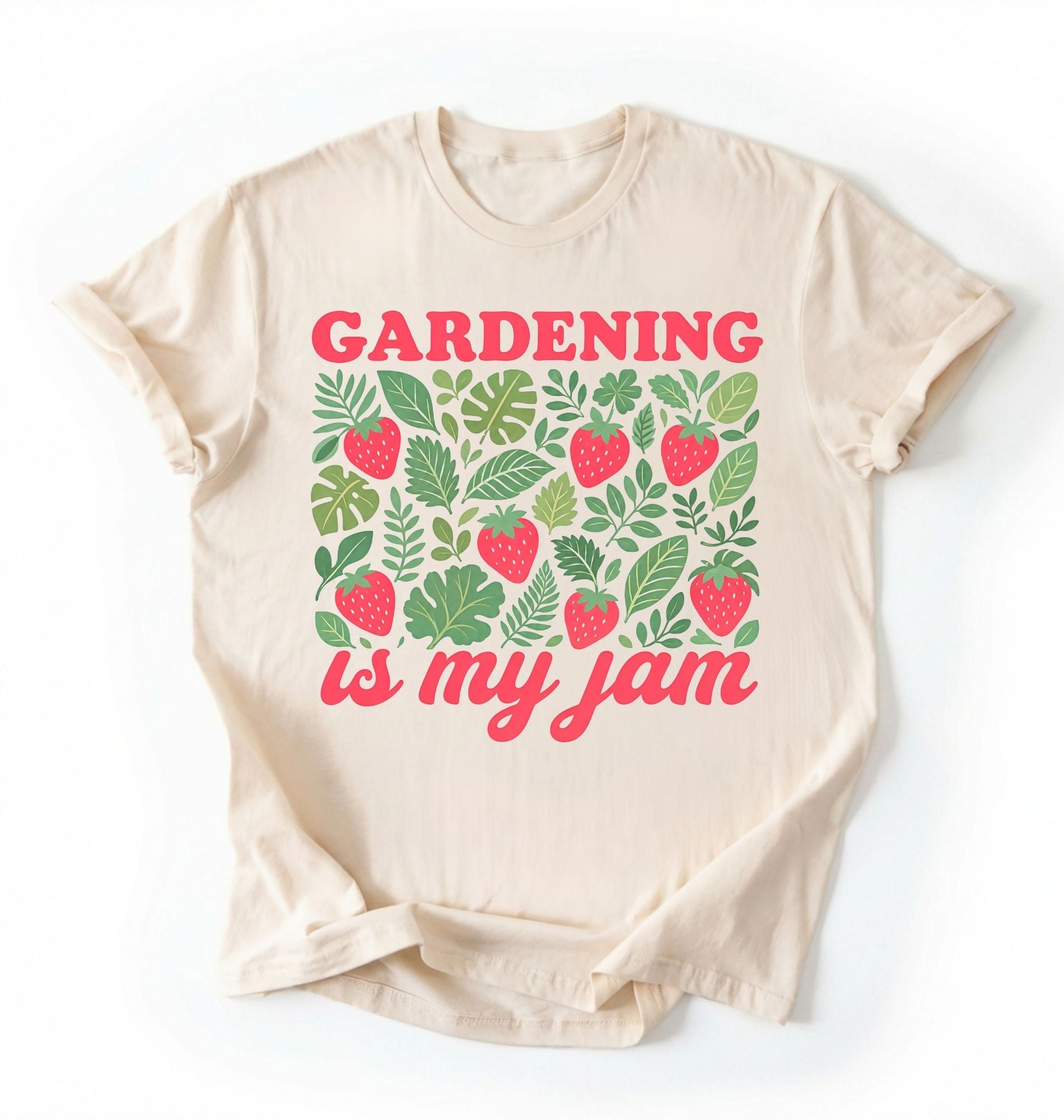 Flat lay of an ivory gardening is my jam shirt white funny plant lover t shirt cute strawberry garden gift on a white background 