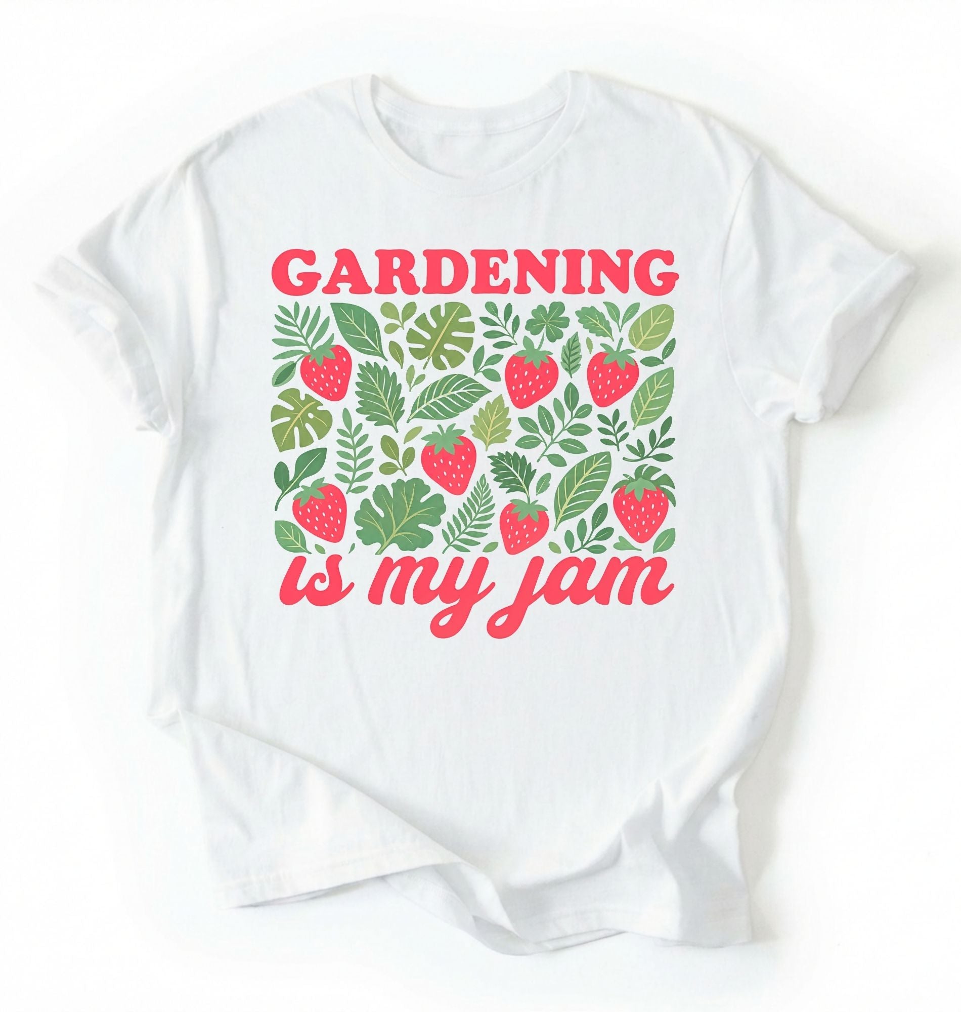 Flat lay of a white gardening is my jam shirt white funny plant lover t shirt cute strawberry garden gift on a white background 