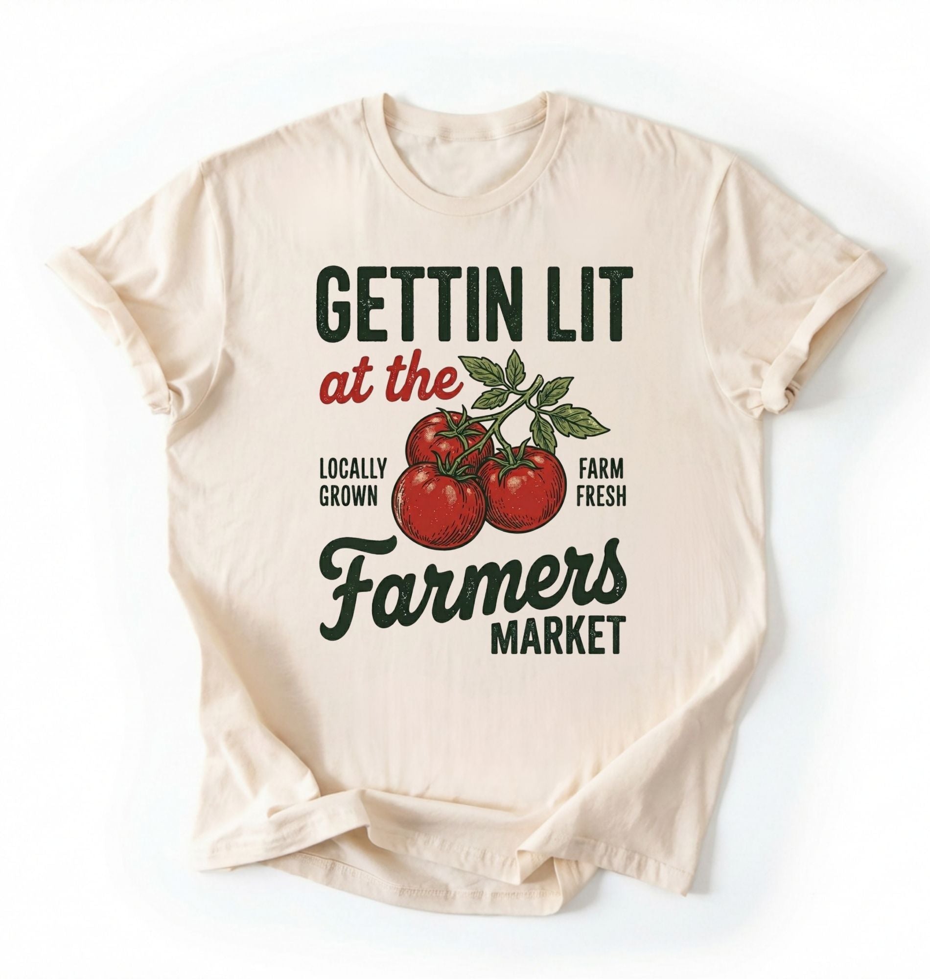 Flat lay of a Natural t-shirt featuring tomatoes and text reading “Gettin Lit at the Farmers Market Locally Grown Farm Fresh.” Funny farmers market shirt pun perfect gift for gardeners homesteaders and vegetable lovers on a white background 