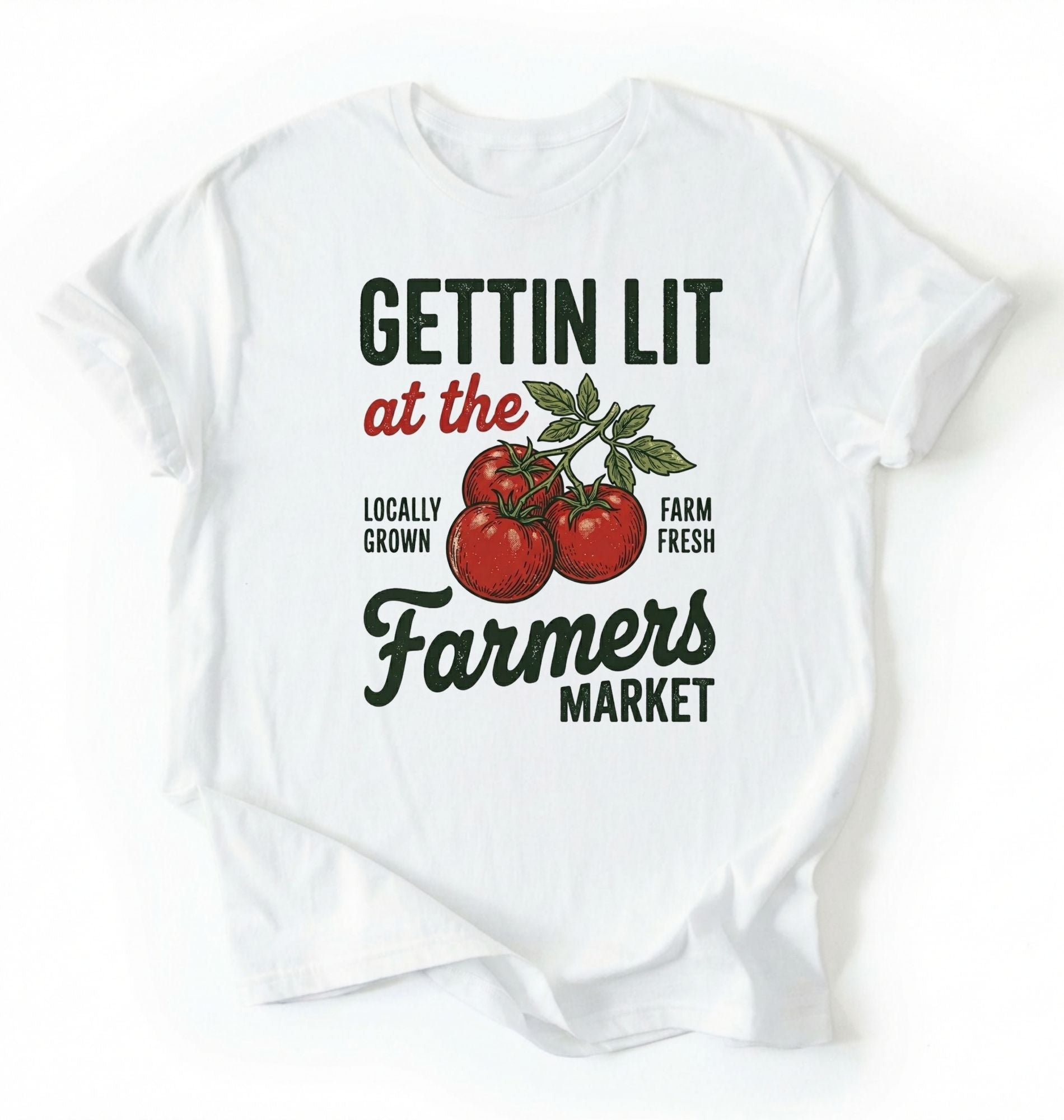 Flat lay of a white t-shirt featuring tomatoes and text reading “Gettin Lit at the Farmers Market Locally Grown Farm Fresh.” Funny farmers market shirt pun perfect gift for gardeners homesteaders and vegetable lovers on a white background 