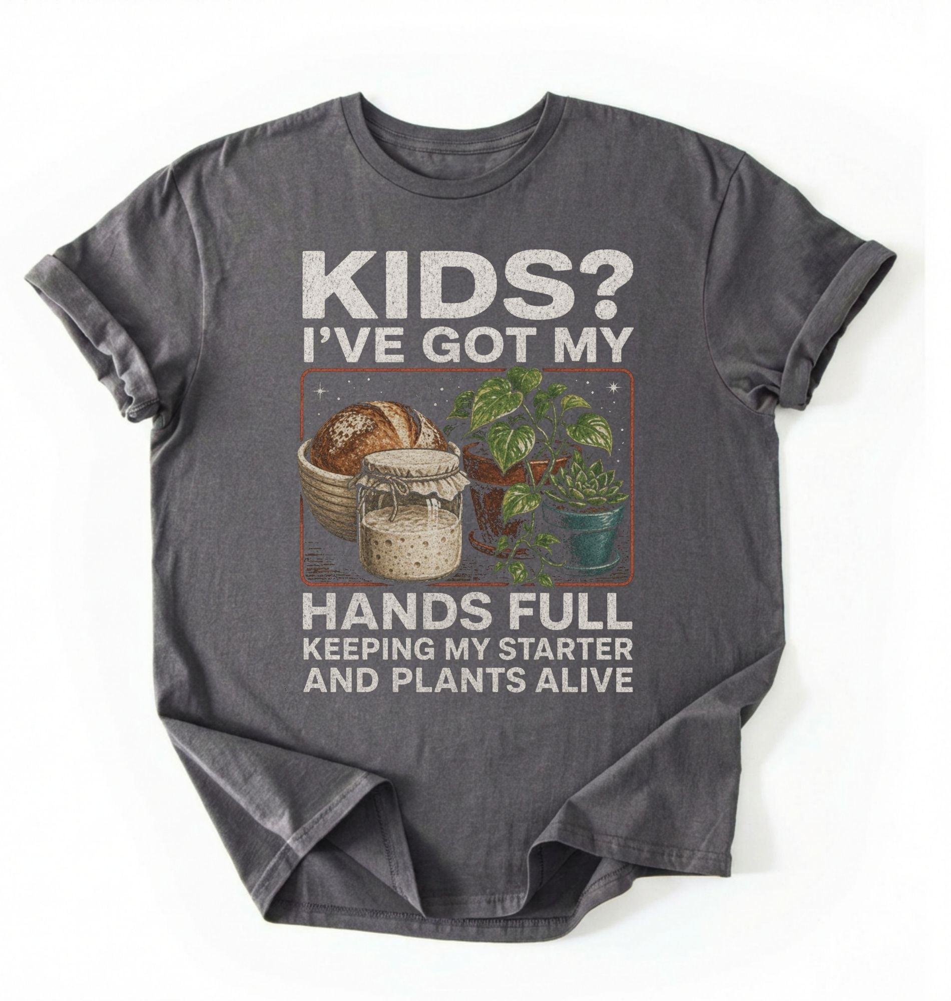 Flat lay of a charcoal hands full sourdough shirt black funny plant lover baking t shirt starter and plants gift on a white background 