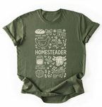 Flat lay of a green homesteader shirt with chicken farm garden and baking icons cottagecore aesthetic gift white t-shirt on a white backgroud
