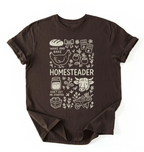 Flat lay of a dark chocolate homesteader shirt with chicken farm garden and baking icons cottagecore aesthetic gift white t-shirt on a white backgroud